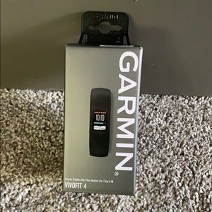 Brand New Garmin VívoFit 4 , Never used (S/M band)